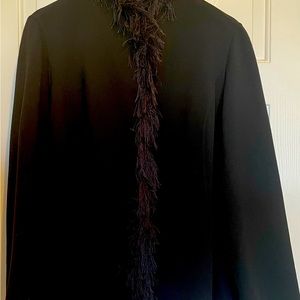 Black Jacket with frenzy trim.